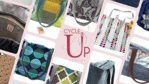 Collection of coloured Tote Bags around the CycleUp Textiles logo with needle and thread.